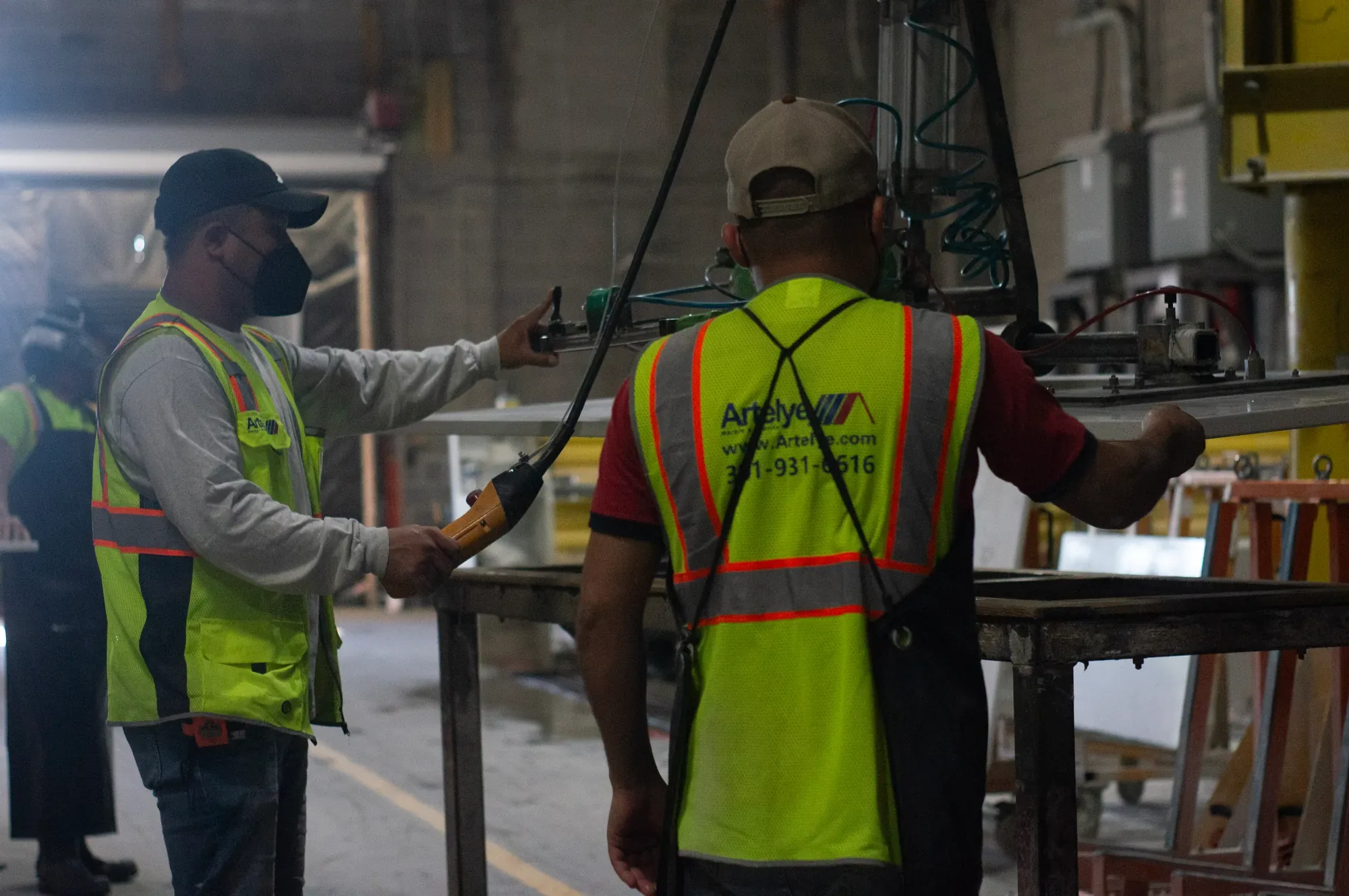 Artelye production team coordinating work on the fabrication floor