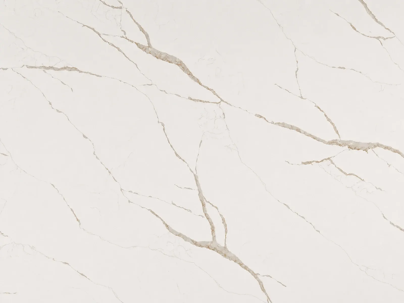 Calacatta Laza Oro quartz surface with warm gold veining