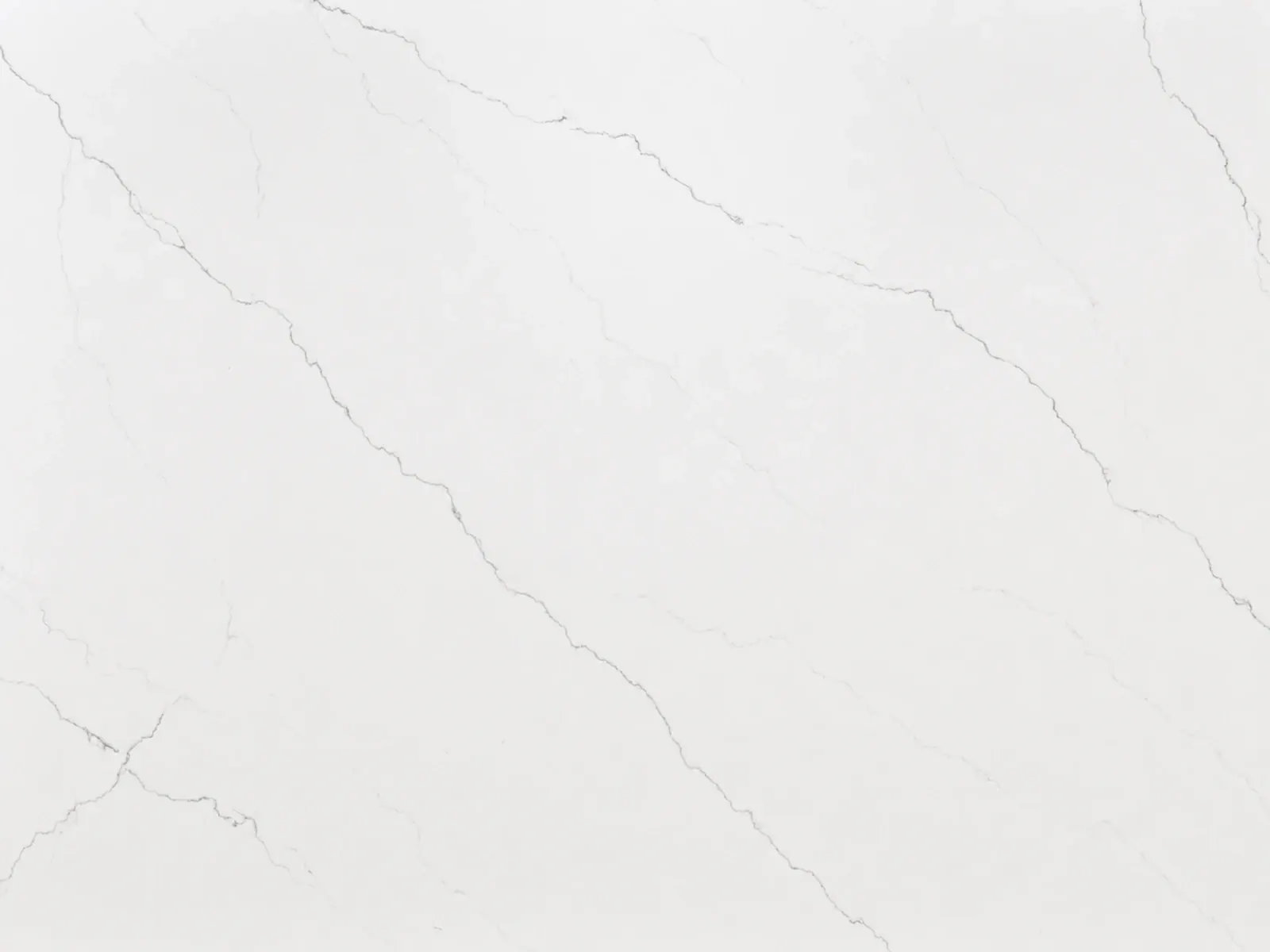 Calacatta Miraggio quartz surface with soft gray veining